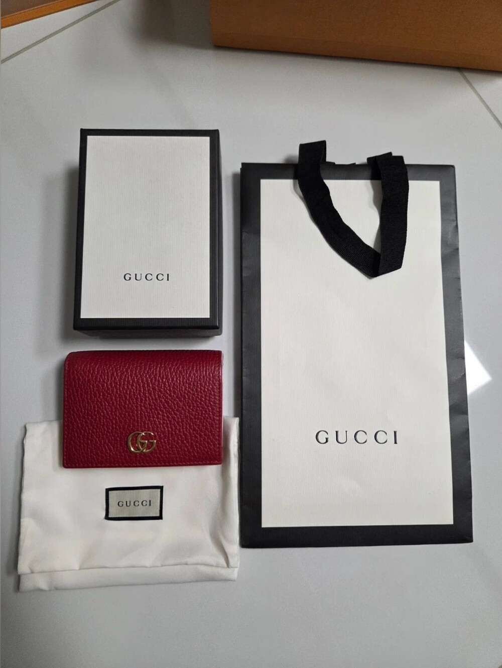 Gucci Red Pebbled Leather Compact Wallet with Gold Double G